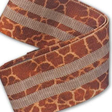 Load image into Gallery viewer, Giraffe print short booty band folded on the ground showing the latex grip strip on the inside
